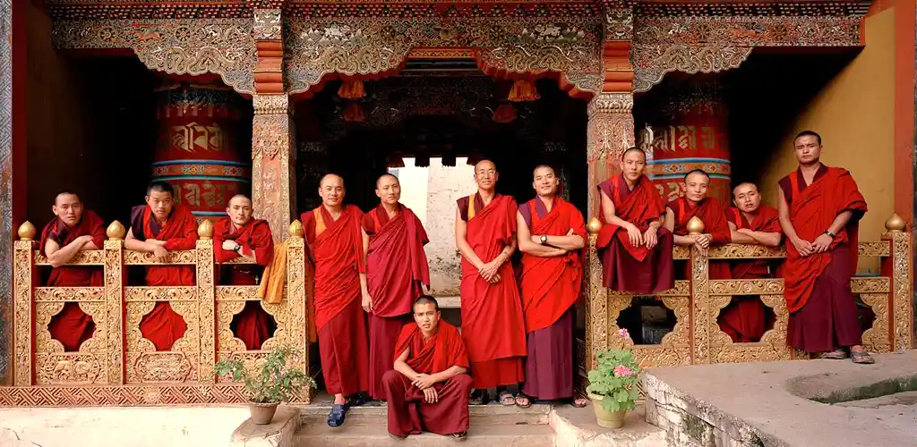 Monks posing for photo at Tango Monastery in Bhutan by Mark Tuschman