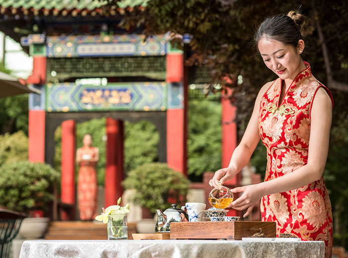Tea server in Xian, China