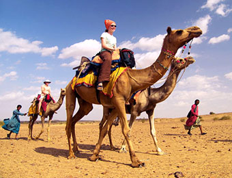 Camel safari riders in Rajasthan, India