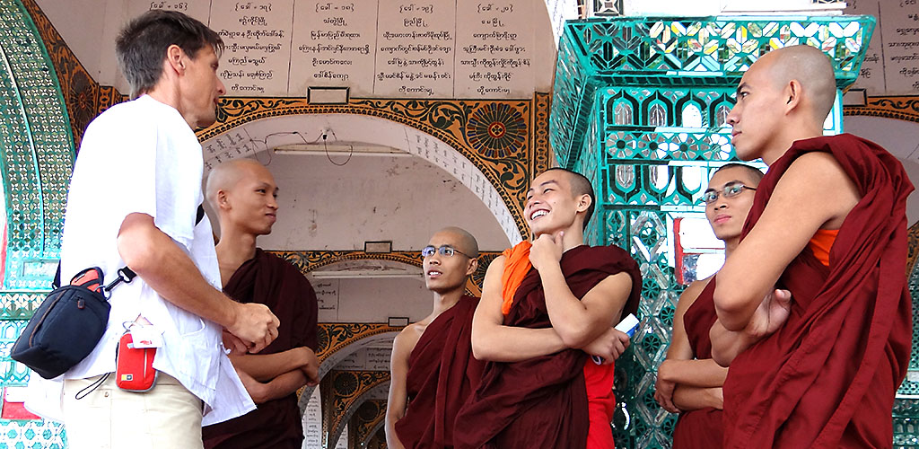 Conversing with student monks in Mandalay, Myanmar