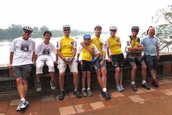 Family bicycle tour group in Hue, Vietnam
