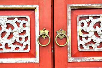 Door in royal design in Hue, Vietnam