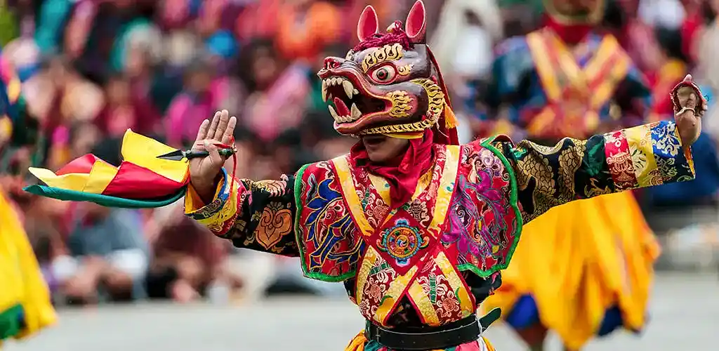 Masked dancer at Bhutan festival