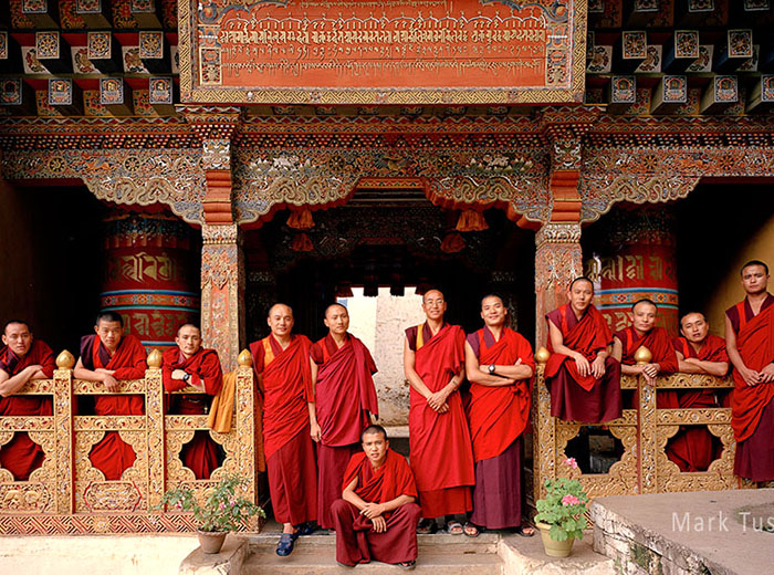 Monks at Yango Monastery in Bhutan by Mark Tuschman
