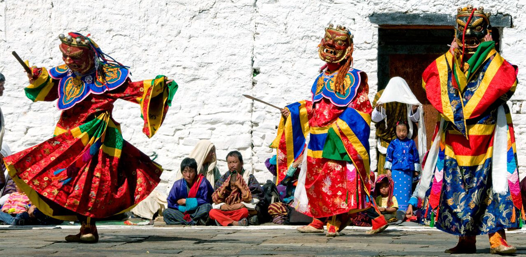 Masked dancers at Bhutan annual festival