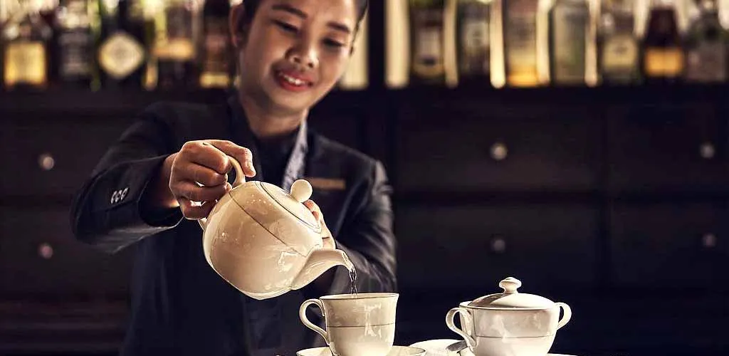 Serving Tea - luxury hotel experience