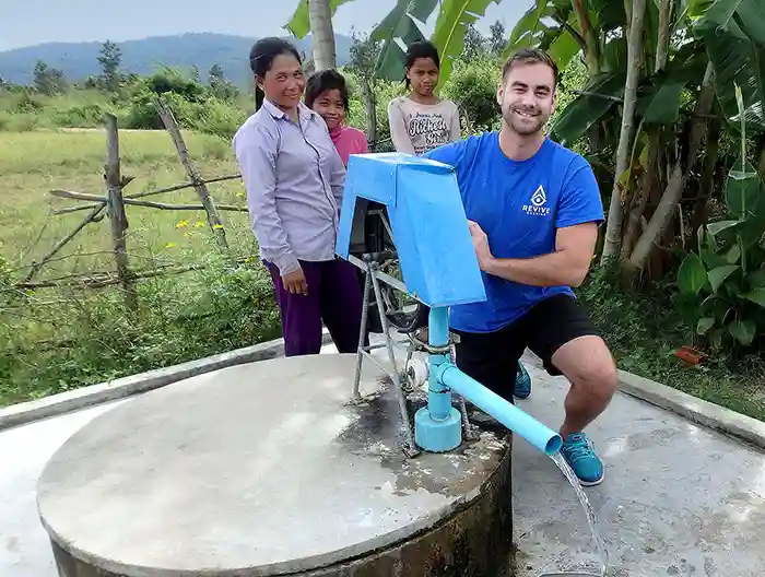 Helping build a well for fresh water in Cambodia