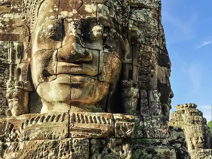Giant stone face at Bayon temple in Angkor Wat, Cambodia