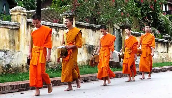 Monks walking in Luang Prabang, Laos