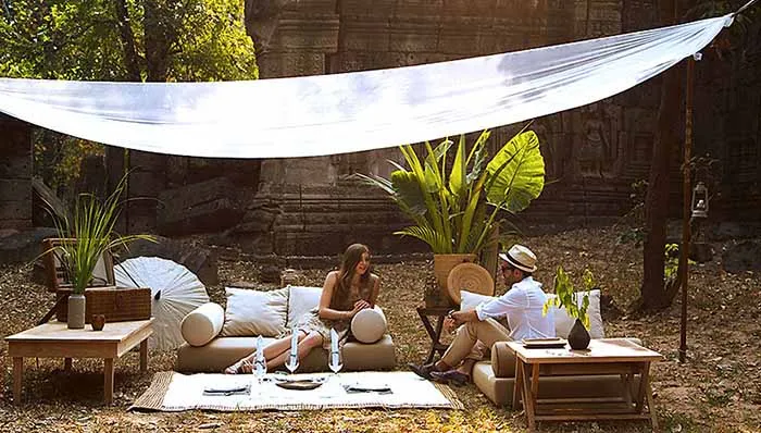 Honeymoon couple at private luxury camp in Angkor