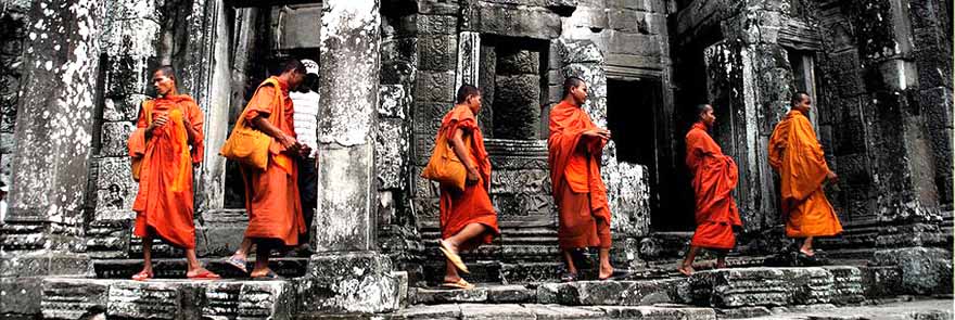 monks in the Bayon temple, Angkor, Cambodia
