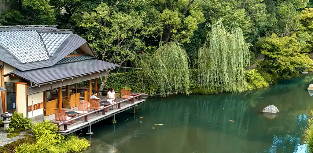 Shakusui teahouse overlooking pond, Kyoto, Japan