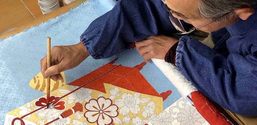 Artist coloring tradtional kimono in Japan