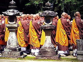 Monks in prayer at Zen temple in Kyoto, Japan