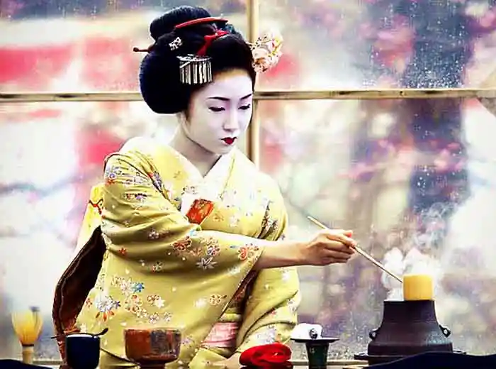 Tea master in Kyoto during private tea ceremony