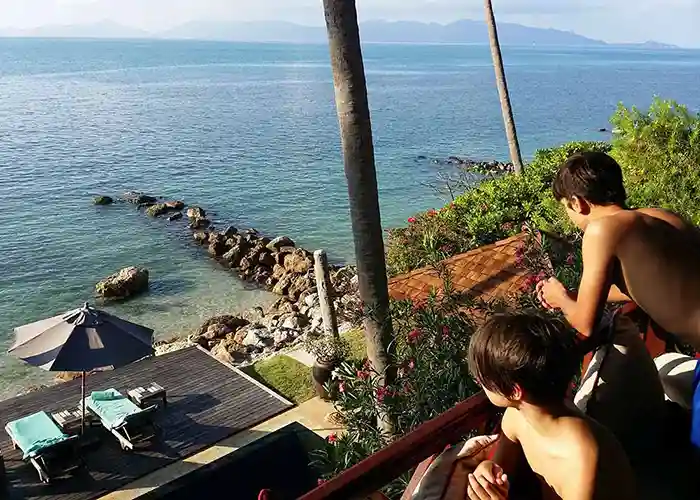 Children overlooking the ocean at Napasai Resort on Koh Samui
