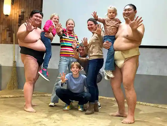 Family visiting a sumo stable in Tokyo, Japan