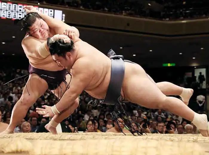 Sumo wrestlers doing battle in Tokyo, Japan