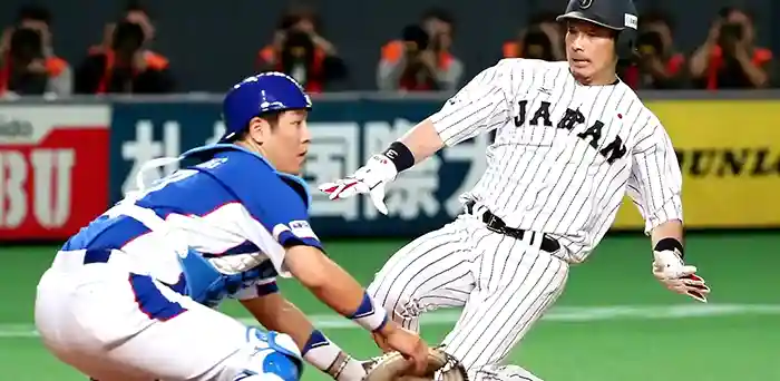 Tokyo Giants Baseball player sliding home