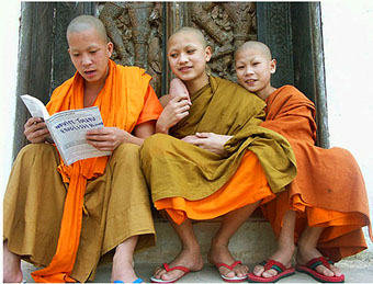 Young monks reading, Luang Prabang, Laos