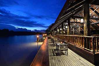 Sukau Rainforest Lodge terrace at night