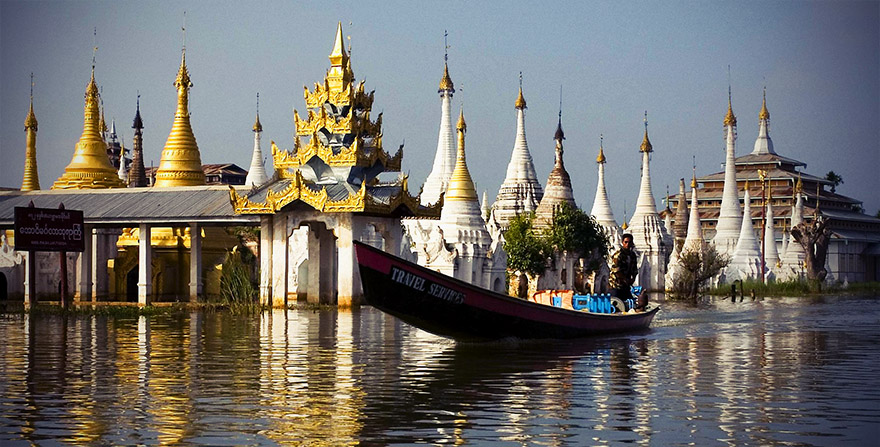 Boat cruise past temple on Inle Lake, Myanmar