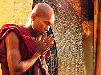 Monk offering prayers