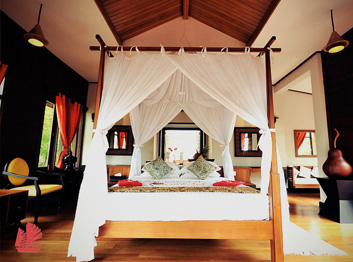 Poster bed in deluxe room of Aureum resort on Inle Lake, Myanmar (Burma)