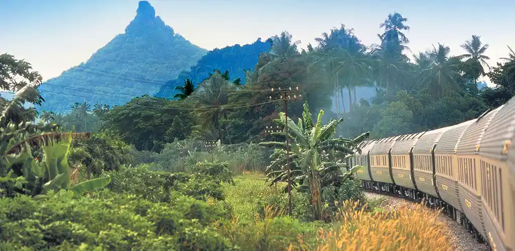 Belmond Eastern & Oriental luxury train in Malaysian countryside