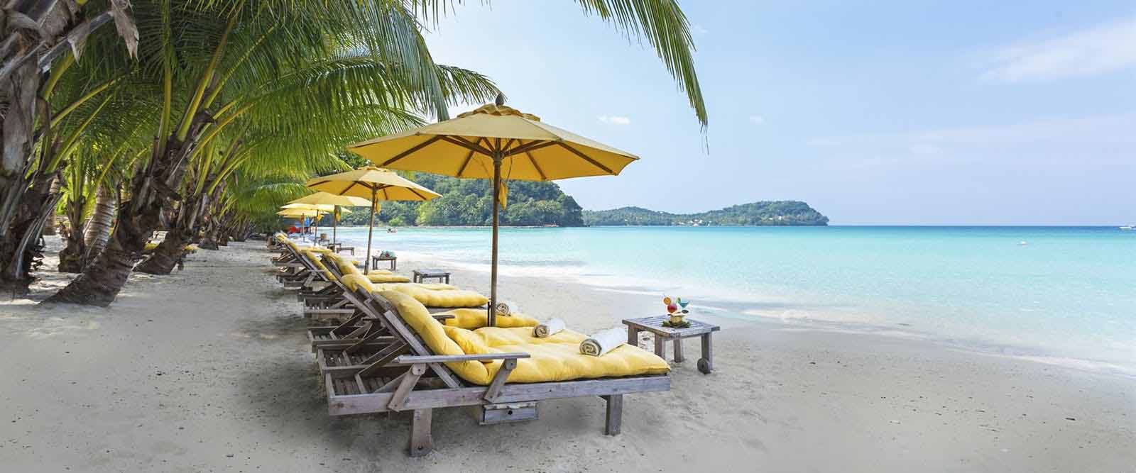 Beachfront lounge chair with view at Soneva Kiri luxury resort on Koh Kood, Thailand