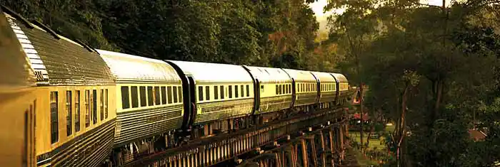 Belmond Eastern & Oriental Express train at sunset