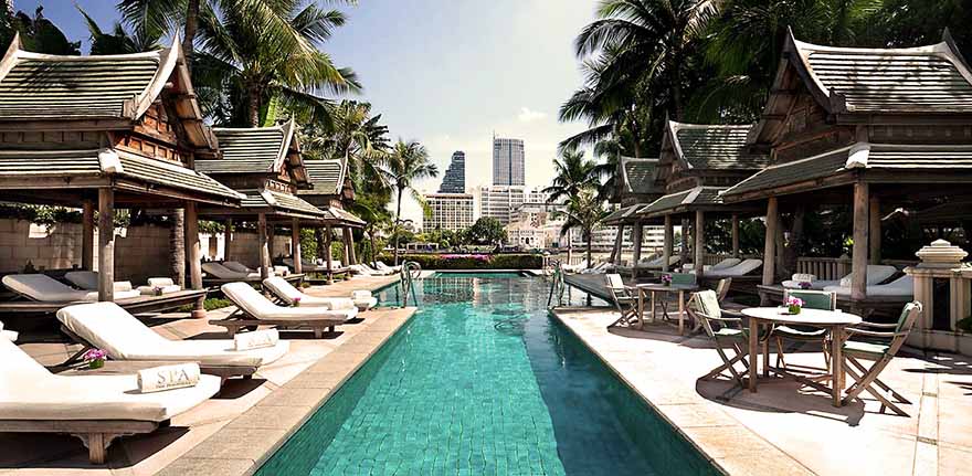 Pool with river view at the Peninsula Hotel in Bangkok, Thailand