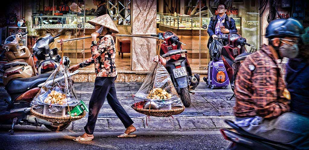 Hanoi street scene by photographer Neville Wootton