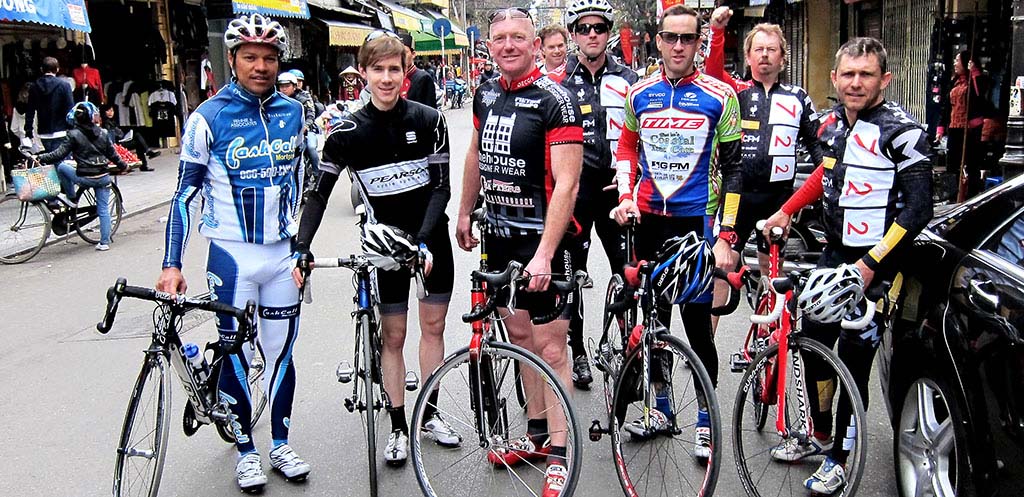Cycling tour group in Vietnam, including Willard Ford and Neal Fraser of Redbird