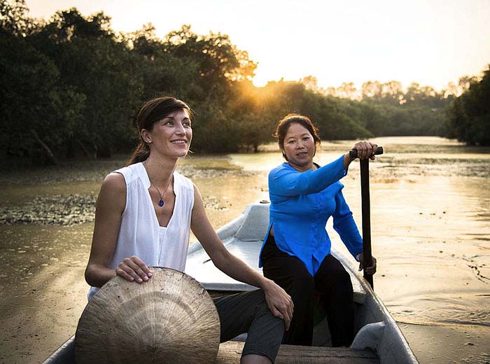 Crusing by sampan on the Mekong river in Vietnam