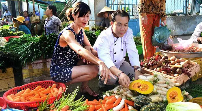 Shopping with chef for cooking class in Hoi An, Vietnam