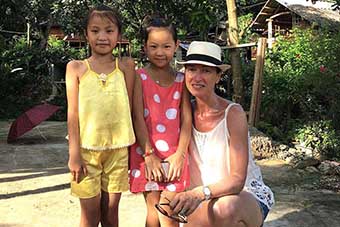Posing with local girls in Mai Chau, Vietnam