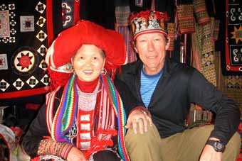 Traveler posing with Red Tao tribeswoman in Sapa, Vietnam