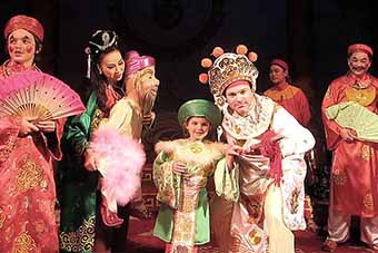Family performing with the Hanoi traditional opera troupe