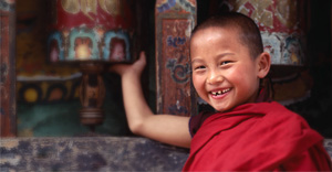 Smiling monk in Bhutan monestary